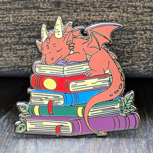Dragon Sleeping on Top of Books Enamel Pin - 1.5"